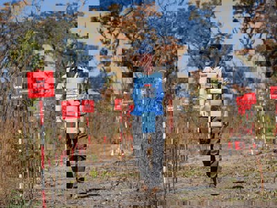 Duke of Sussex walking through a minefield in Angola