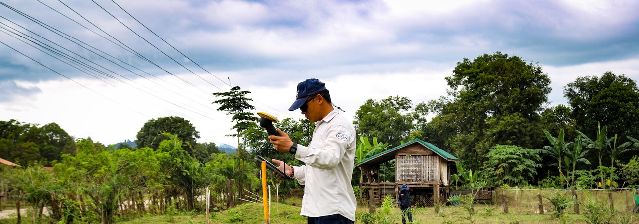 Laos deminer uses a Trimble transmitter