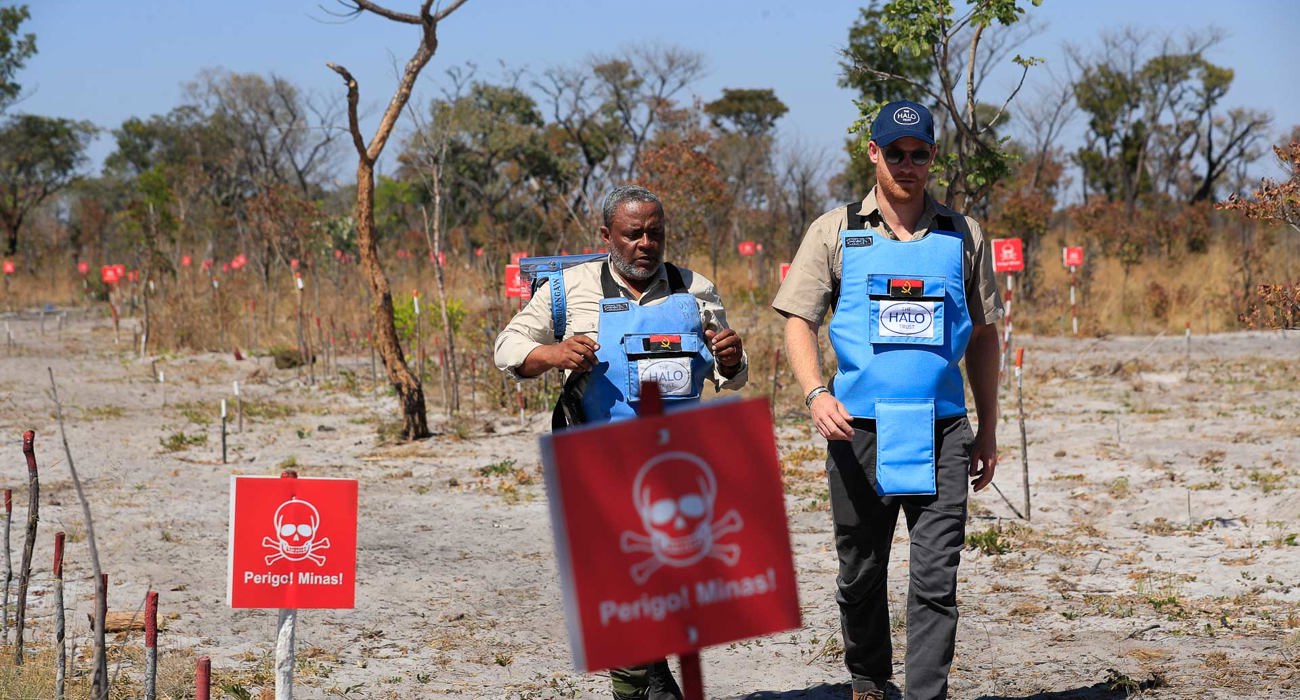 Prince Harry walks through a minefield in Angola