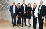 Prince Harry, HALO leadership members, and representatives of Grapes for Humanity pose at an event