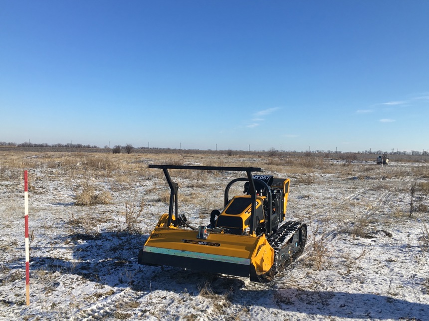 Robocut mechanical demining machine in a snowy field in Ukraine