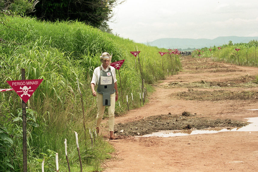 Princess Diana walking through a minefield in Angola in 1997