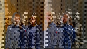 Group of 4 women wearing HALO Trust jumpers