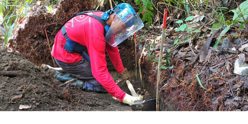 Fray Martin Palomo, a HALO deminer, conducts a complete excavation while wearing PPE