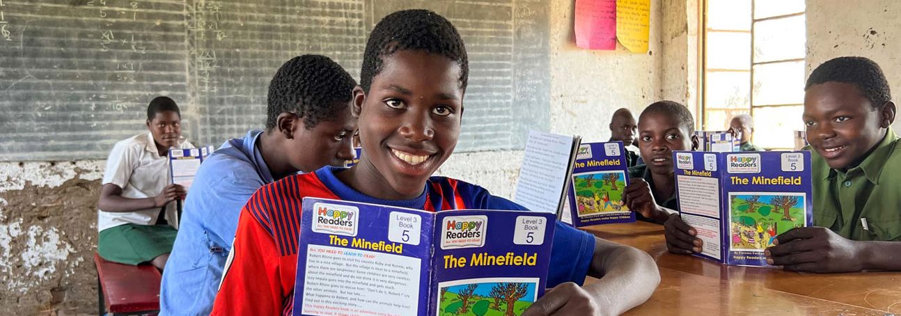 Children in a classroom receive an Explosive Ordnance Risk Education session in Zimbabwe