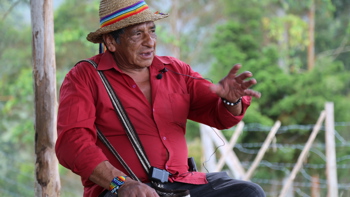Luis Ángel, an Elder from Kwet Wala Indigenous Reservation talks while sitting down outside