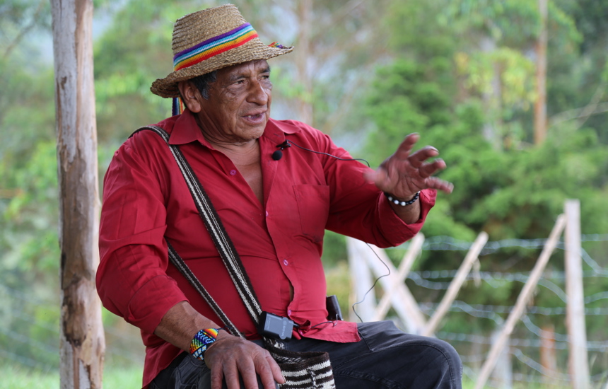 Luis Ángel, an Elder from Kwet Wala Indigenous Reservation talks while sitting down outside